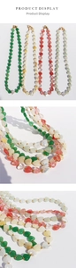 Detail showing heart-shaped stones and baroque pearls with gold lobster clasps