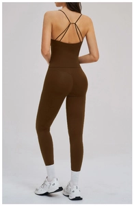 Detail of cross-back strap design on a dark brown high-waist yoga sports set