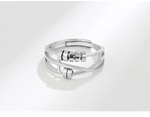 Detail of adjustable silver fidget ring with sliding beads for anxiety relief