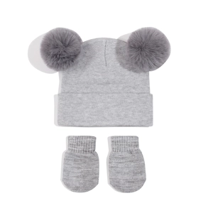 Gray knitted baby winter set with double pom pom hat and matching warm mittens