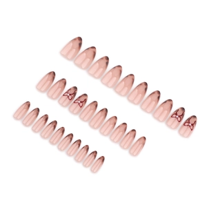 French leopard print press-on nails with almond shape, red bows, and pearl accents