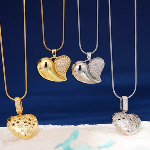 Elegant heart shaped zircon pendants in gold and silver finish with snake chains