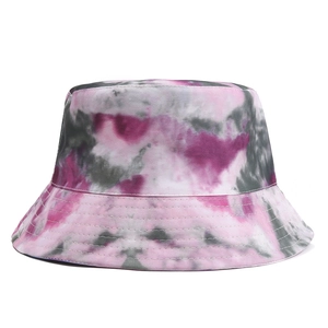 Detailed view of tie-dye bucket hat with pink and grey patterns and reinforced stitching