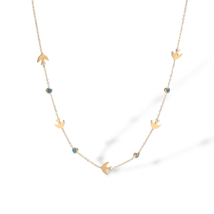 Detailed view of 18K gold plated chain with bird charms and blue evil eye beads