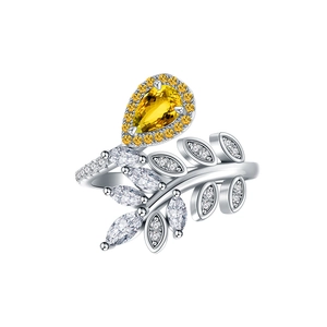 Leaf-shaped silver ring featuring a yellow pear-cut gemstone and zircon accents