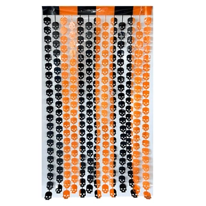 Halloween skull tinsel curtain decoration in black and orange for festive party wall decor