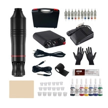 Complete tattoo kit with black rotary pen, power supply, colorful inks, and hard carry case