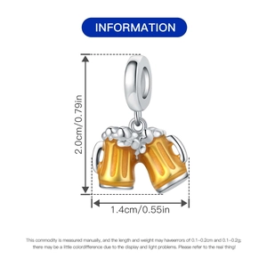 Detail view of beer mug pendant with yellow enamel and size 2.0cm by 1.4cm