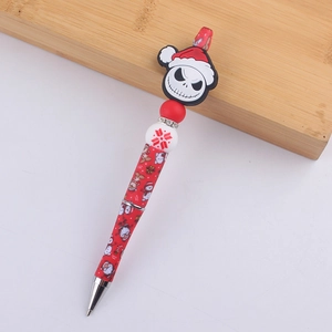 Close-up of Christmas silicone beaded pen featuring Jack Skellington Santa decor