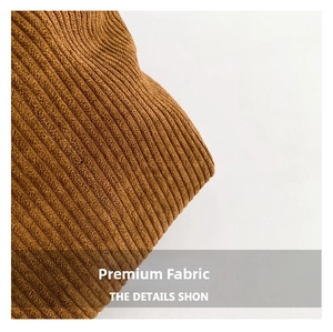 Macro view of dark brown corduroy fabric texture showing vertical stripe details