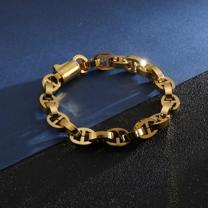 Detailed close-up of golden stainless steel geometric curb chain link for men hip hop style
