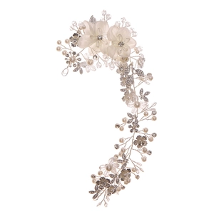 Silver bridal hair comb with cream faux flowers and white pearl vine decorations