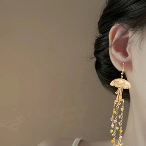 Golden jellyfish tassel earrings with colorful glass beads and stars for beach vacation