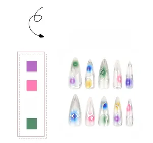 Detailed view of long stiletto press-on nails with silver flame pattern and aurora finish