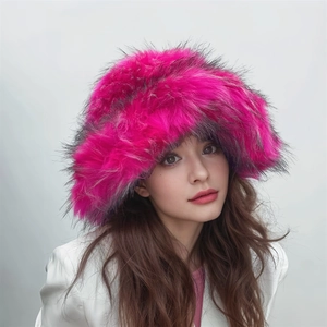 Close-up of vibrant hot pink faux fur hat texture and plush material on model