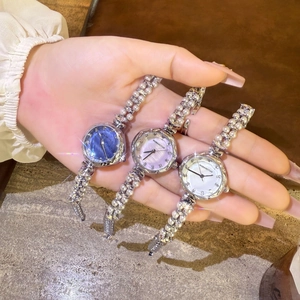 Elegant quartz bracelet watches with mother-of-pearl dials and pearl beaded wristbands