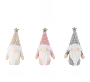 Close-up of three Christmas gnomes with knit hats, pentagram stars and long white beards
