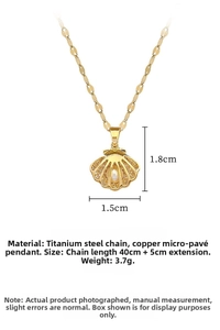 Detail view of gold shell pearl necklace showing 40+5cm length and 1.5cm pendant size