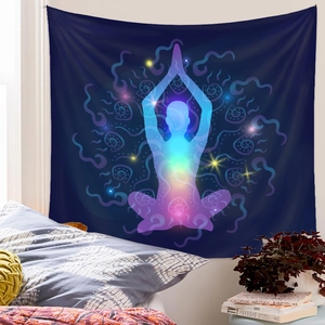Detail of meditation yoga wall tapestry with glowing silhouette on deep blue fabric