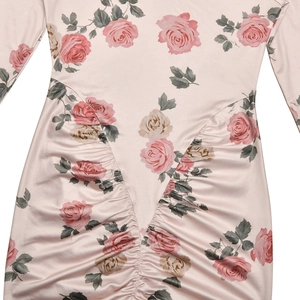 Detailed view of the gathered waist design on this pink floral print slim fit dress