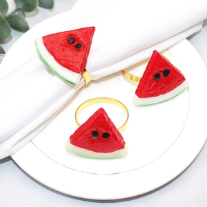 Watermelon slice napkin rings with gold metal bands for summer dining table decoration