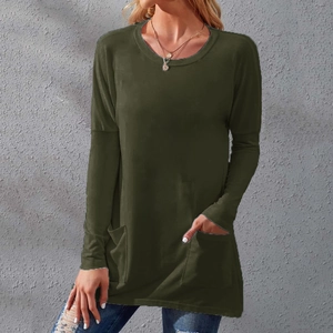 Detail of olive green crew neck tunic top featuring side pockets and a relaxed casual fit