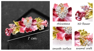 Detail showing enamel flower hair clip with rhinestones and 3D floral craft, 7cm length