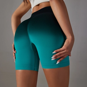 Macro detail of seamless gradient high-waisted fitness shorts with ribbed textures