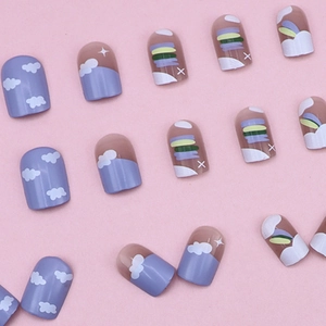 Matte lilac press-on nails set with cloud and rainbow patterns on pink background