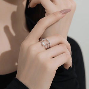 Detailed view of S925 silver ring featuring moon and star motifs with pave-set zircons