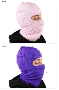 Detailed knit texture of pink and purple distressed balaclava masks with fringe effect