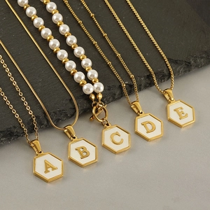 18K gold plated stainless steel hexagonal initial necklaces with white enamel pendants