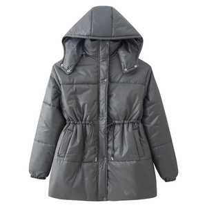 Detail of grey hooded parka featuring adjustable drawstring waist and snap button closure