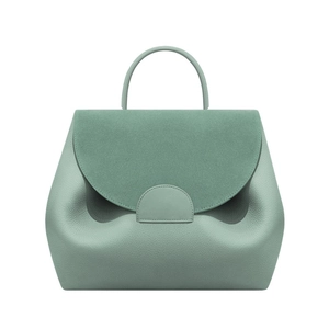 Sage green trapezoid leather handbag with suede flap and lychee pattern finish