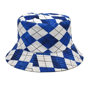 Detail shot of the blue and white checkered pattern on a stylish summer bucket hat