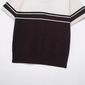 Retro ribbed knit polo shirt with striped colorblock pattern in cream and black