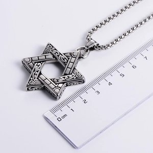 Stainless steel hexagram star pendant with Celtic patterns measuring 3.5cm width