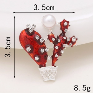 Macro detail of red enamel cactus charm with white rhinestones and dimensions