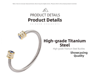 Close-up of twisted steel cable bracelet with gold accents and blue center stone