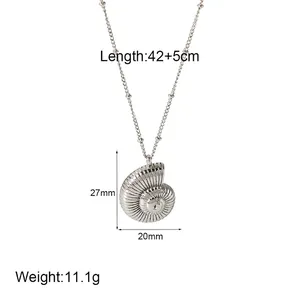 Macro shot of seashell pendant showing 27mm size and beaded chain dimensions