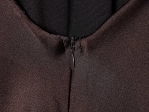 Close-up of matching invisible zipper on high-quality satin dress fabric detail