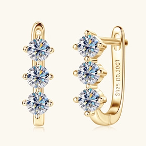Detailed close-up of gold-plated S925 silver hoop earring with three moissanite stones