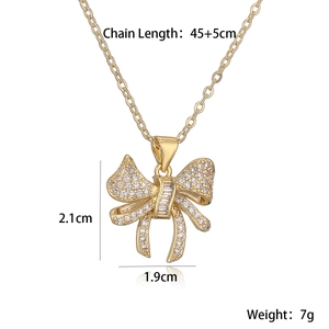 Detailed size map of gold bow pendant necklace with 45+5cm chain and cubic zirconia