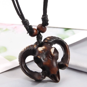 Ethnic turtle shell skull pendant necklace with dark brown beads and black cord strap