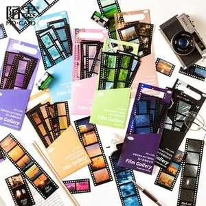 Close-up of retro PET film strip stickers in multiple colors for scrapbooking