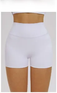 Close-up of high-waist seamless yoga shorts in romantic purple with ribbed texture detail