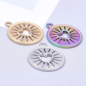 Three stainless steel heart pendants in gold silver and rainbow finishes for DIY necklaces