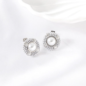 Classic stainless steel stud earrings with white pearl cluster in a silver vintage base