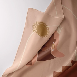 Detail showing smooth silk-like texture and artistic abstract print on bohemian tapestry