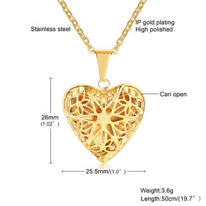 Detail showing dimensions of heart locket pendant in polished gold stainless steel